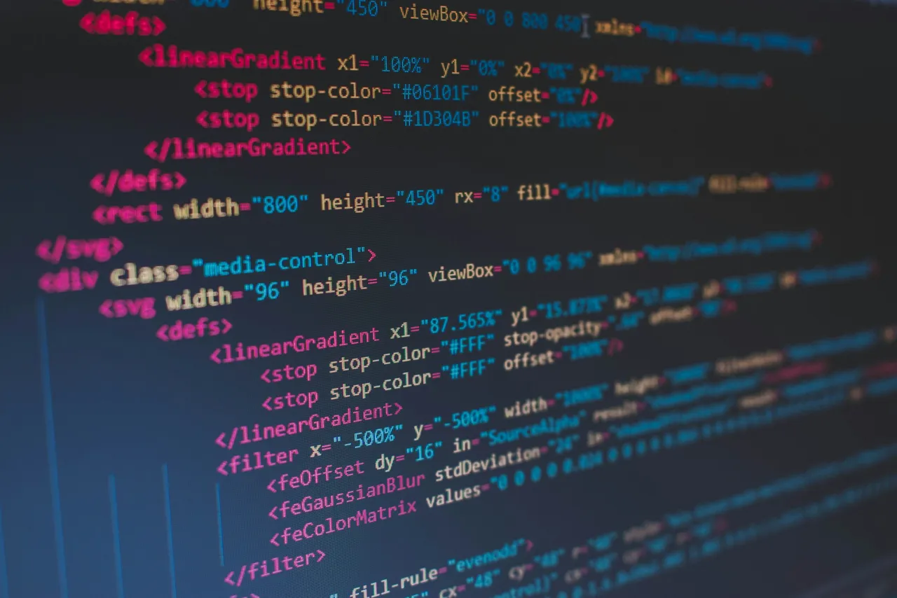HTML code on a screen with div, svg, linearGradient and filter tags